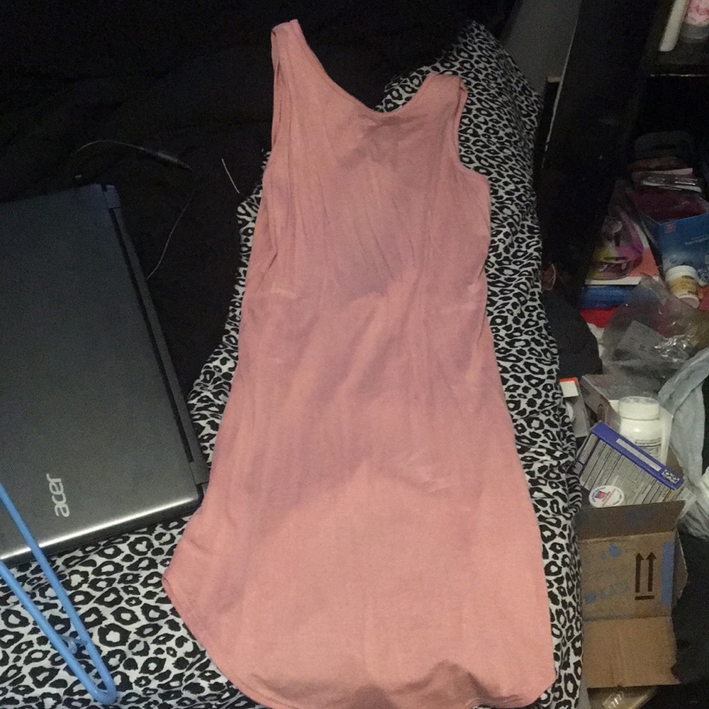 Mini short pink dress with cute tie up back.
